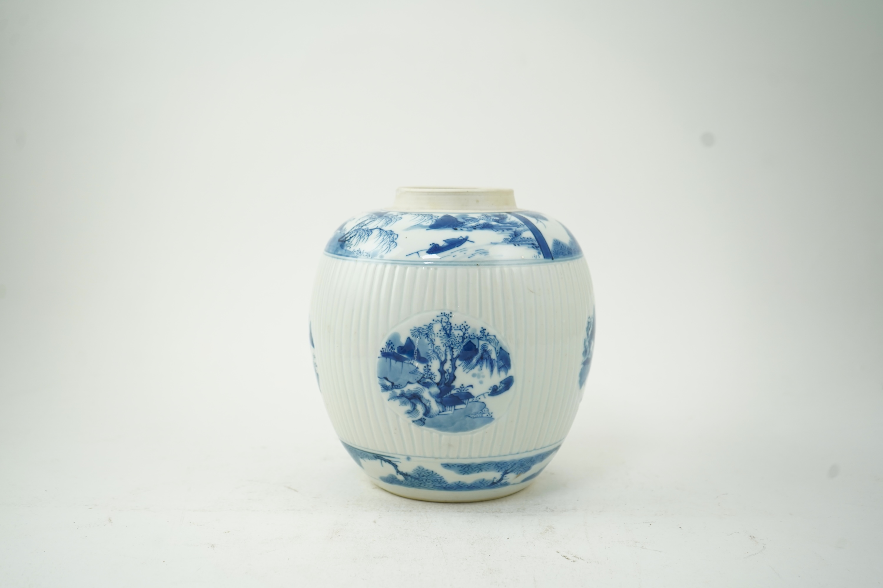 A Chinese blue and white ribbed ovoid jar, in Kangxi style, late 19th/early 20th century